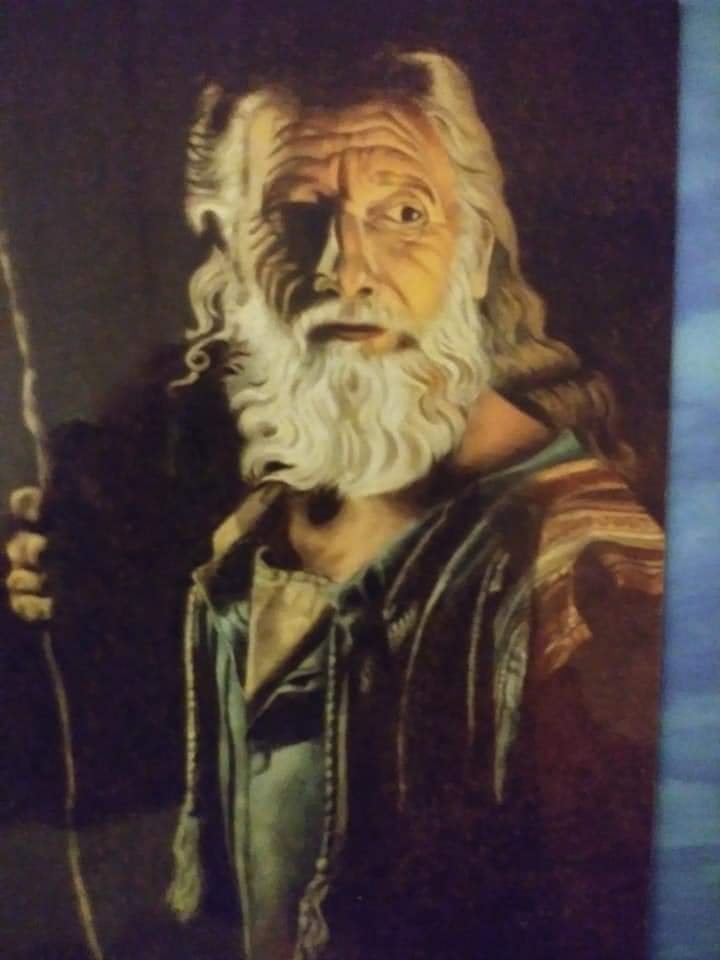 Dramatic painted portrait of Moses holding a staff